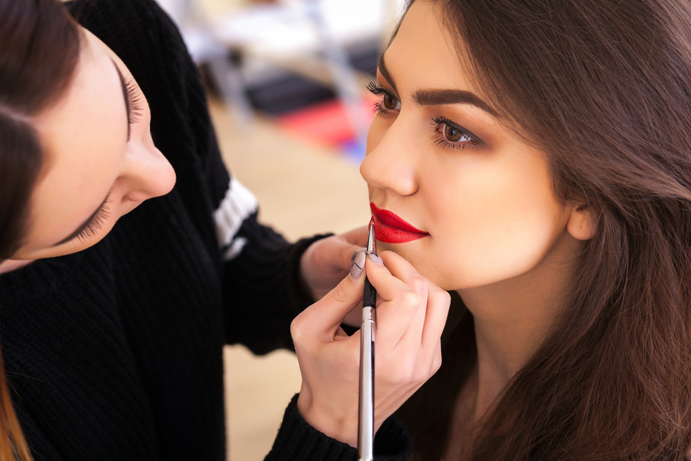 makeup artist doing makeup